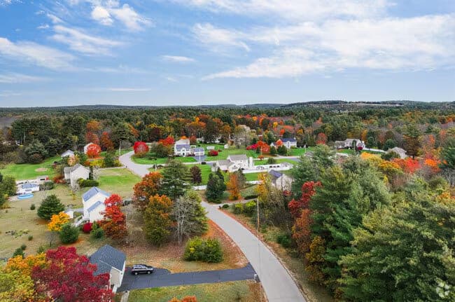 Aerial Semi Rural Homes Winding Road Autumn in Litchfield, NH